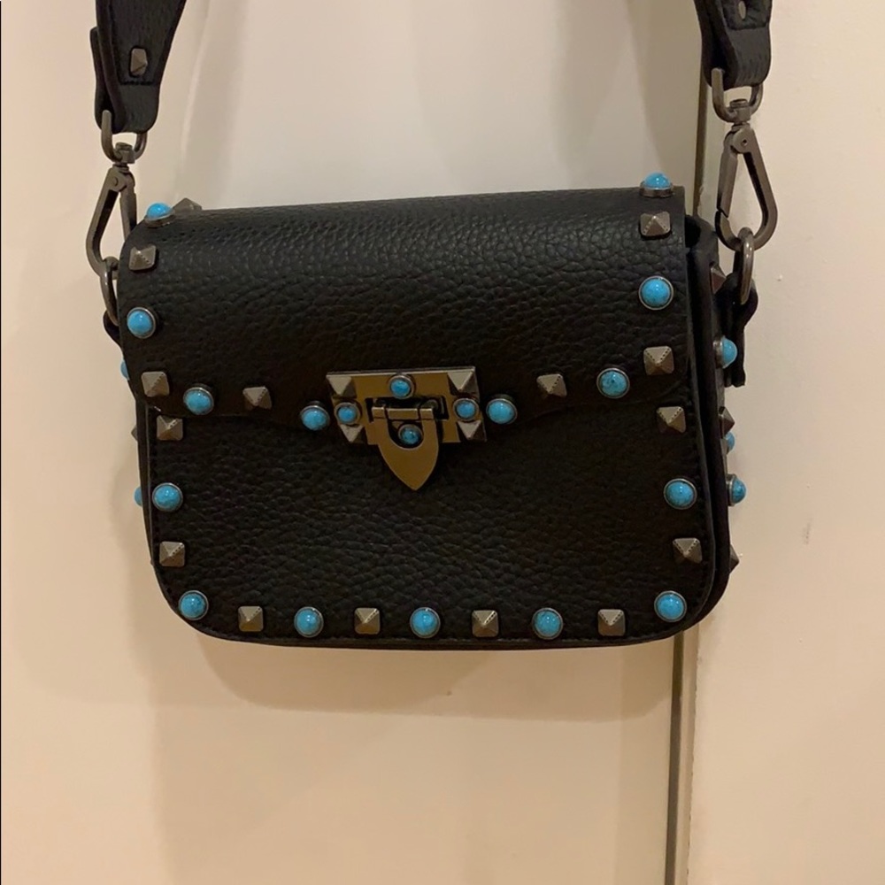 black purse with colorful strap NEVER USED!